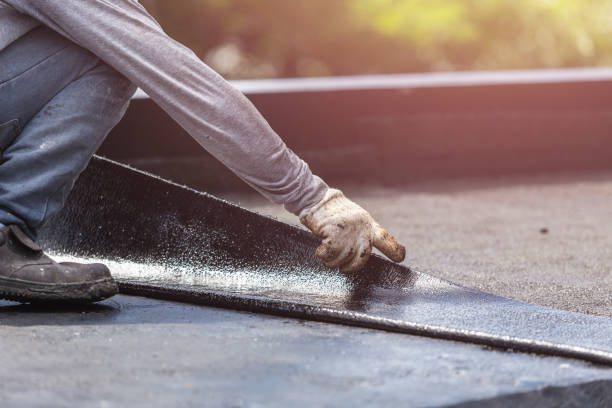 Professional Basement Waterproofing technician working in Boon, MI